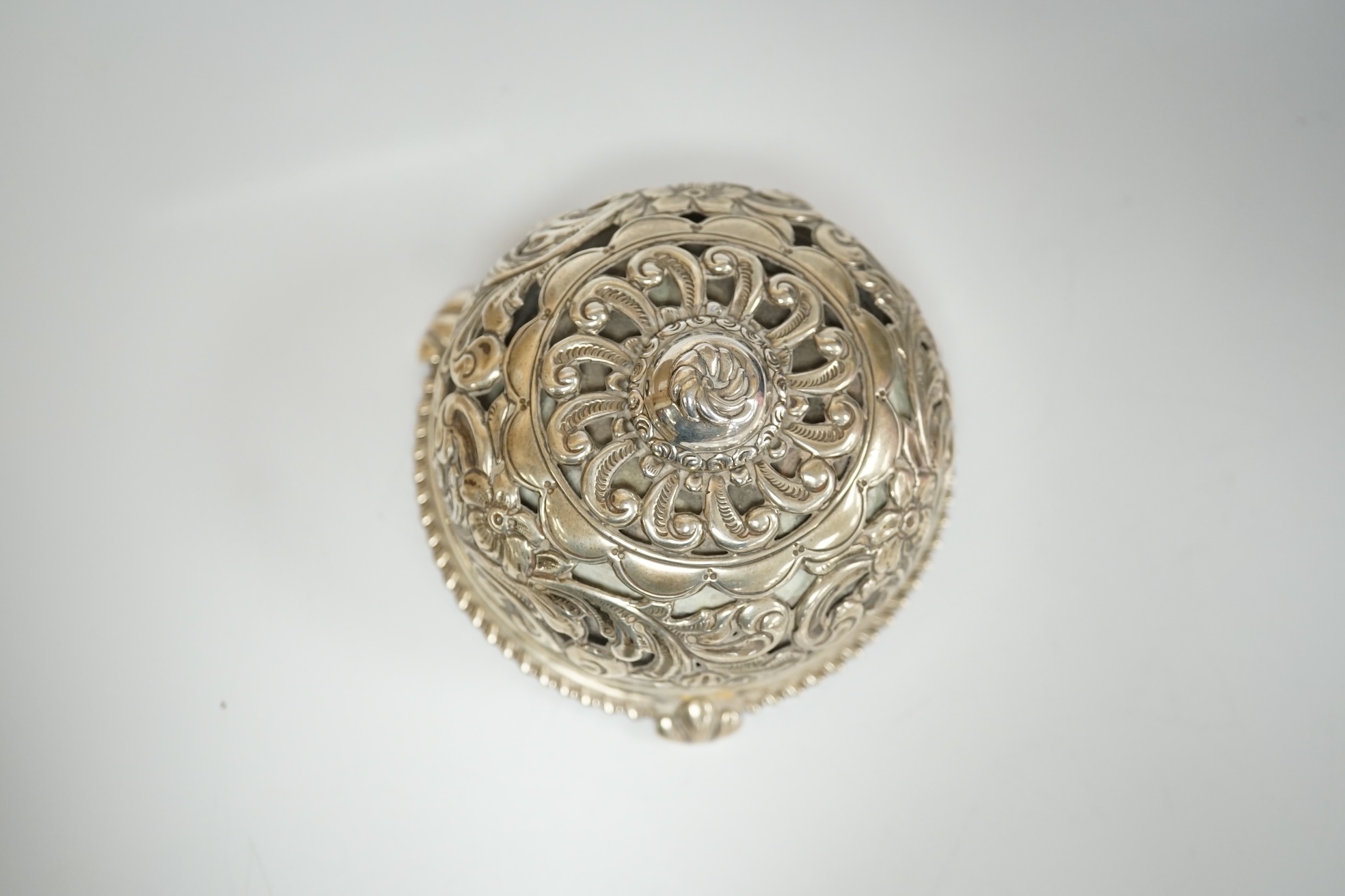 An Edwardian pierced silver table bell, by Deakin & Francis, Birmingham, 1903, diameter 82mm. Condition - poor